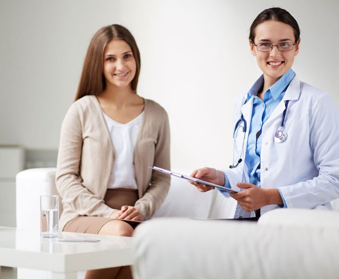 Doctor talking with a patient during a consultation